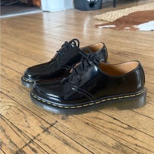 Dr. Martens patented leather round toe oxfords
